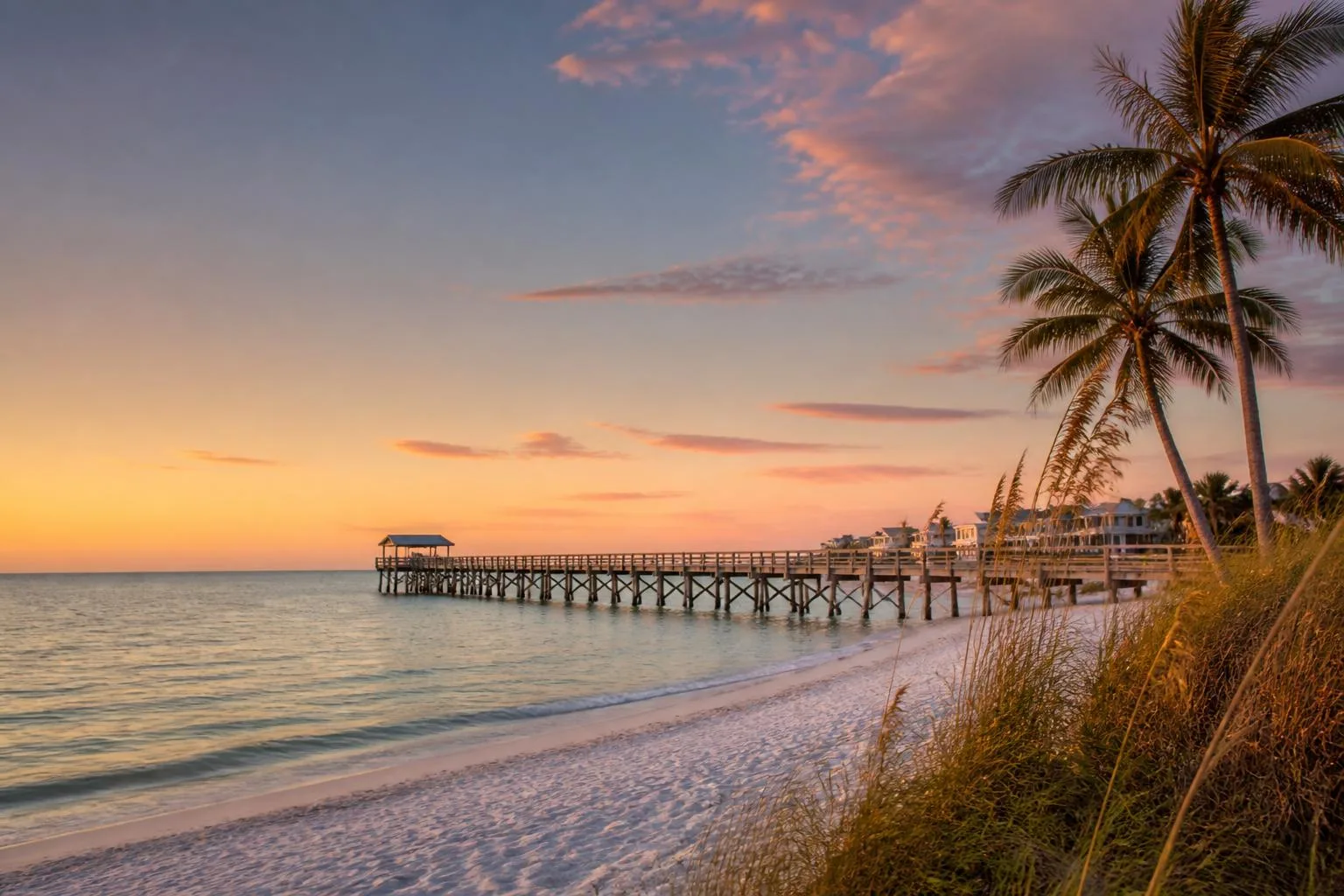 Luxury beachfront vacation rental at sunset in St. Petersburg, Florida
